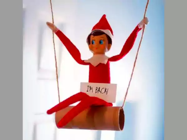 The elf is taking a bathroom swing