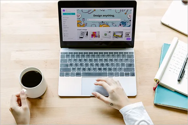 Person Working on a Laptop Stock Image