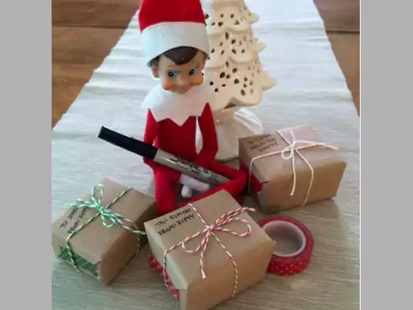 Elf is preparing gifts