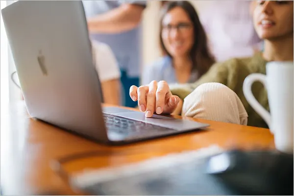 Woman Working on Laptop